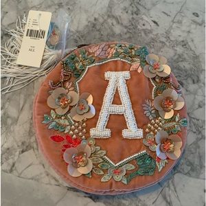 NWT-Anthropology small round little clutch.